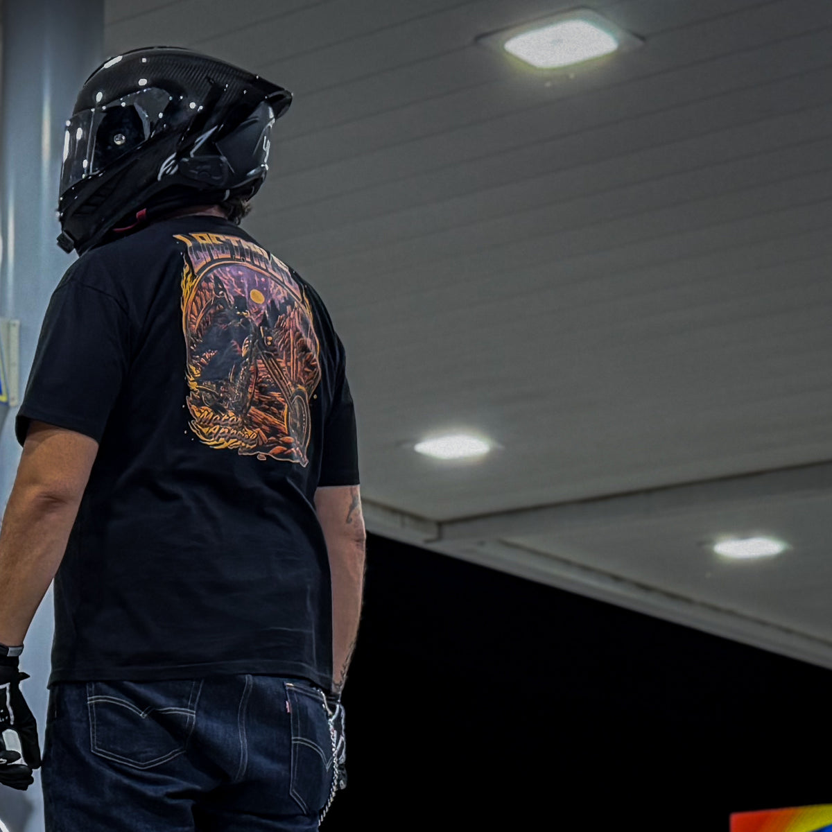 Last Rites Tee men's motorcycle t-shirt worn at a gas station at night, reaper on a chopper back print