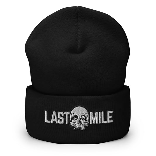 Black cuffed motorcycle beanie with embroidered Last Mile Co. skull logo on the cuff
